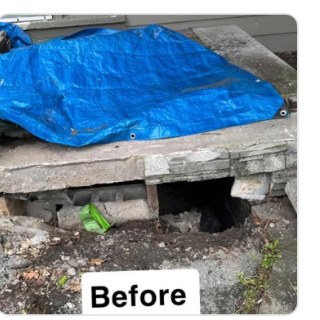 Foundation crawl space before repair, covered with a blue tarp