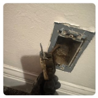 Drywall hole cutout ready for repair